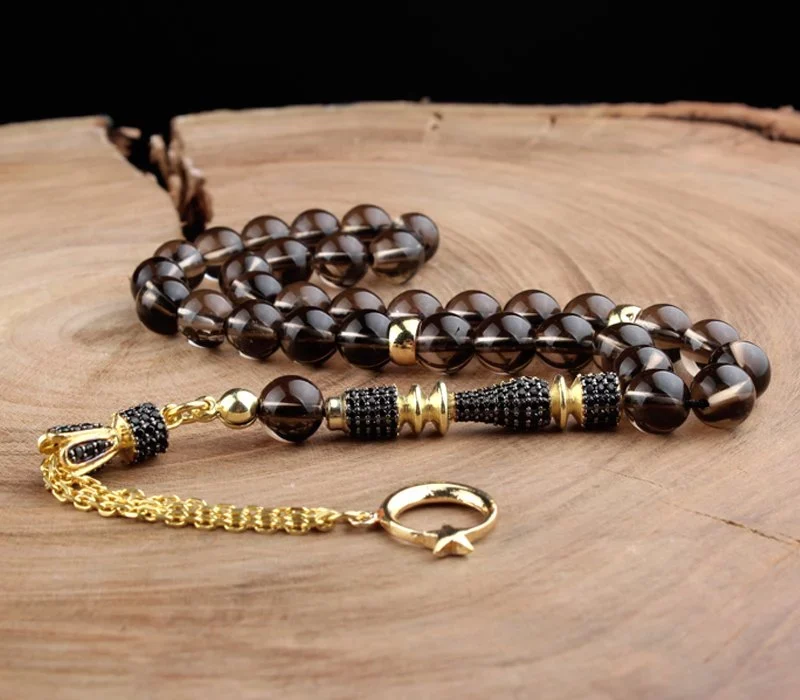 سبحة من حجر الكوارتز ومرصعة بحجر الزركون وشرابة ذهبية