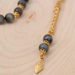 ⁦سبحة حجر عين النمر مطلية بالذهب والفضة⁩ - الصورة ⁦2⁩