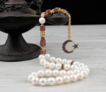 سبحة من اللؤلؤ الطبيعي بحجر الزركون وشرابة فضية