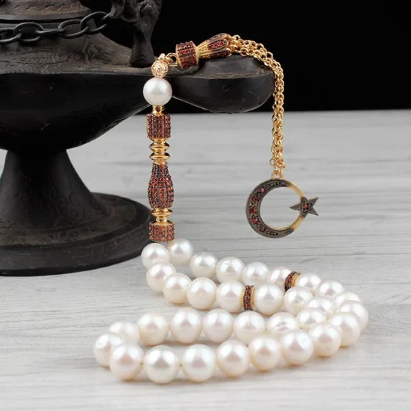 سبحة من اللؤلؤ الطبيعي بحجر الزركون وشرابة فضية