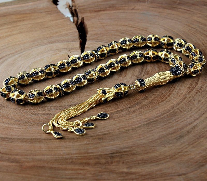 سبحة فضة بحجر الزركون وشرابات مذهبة